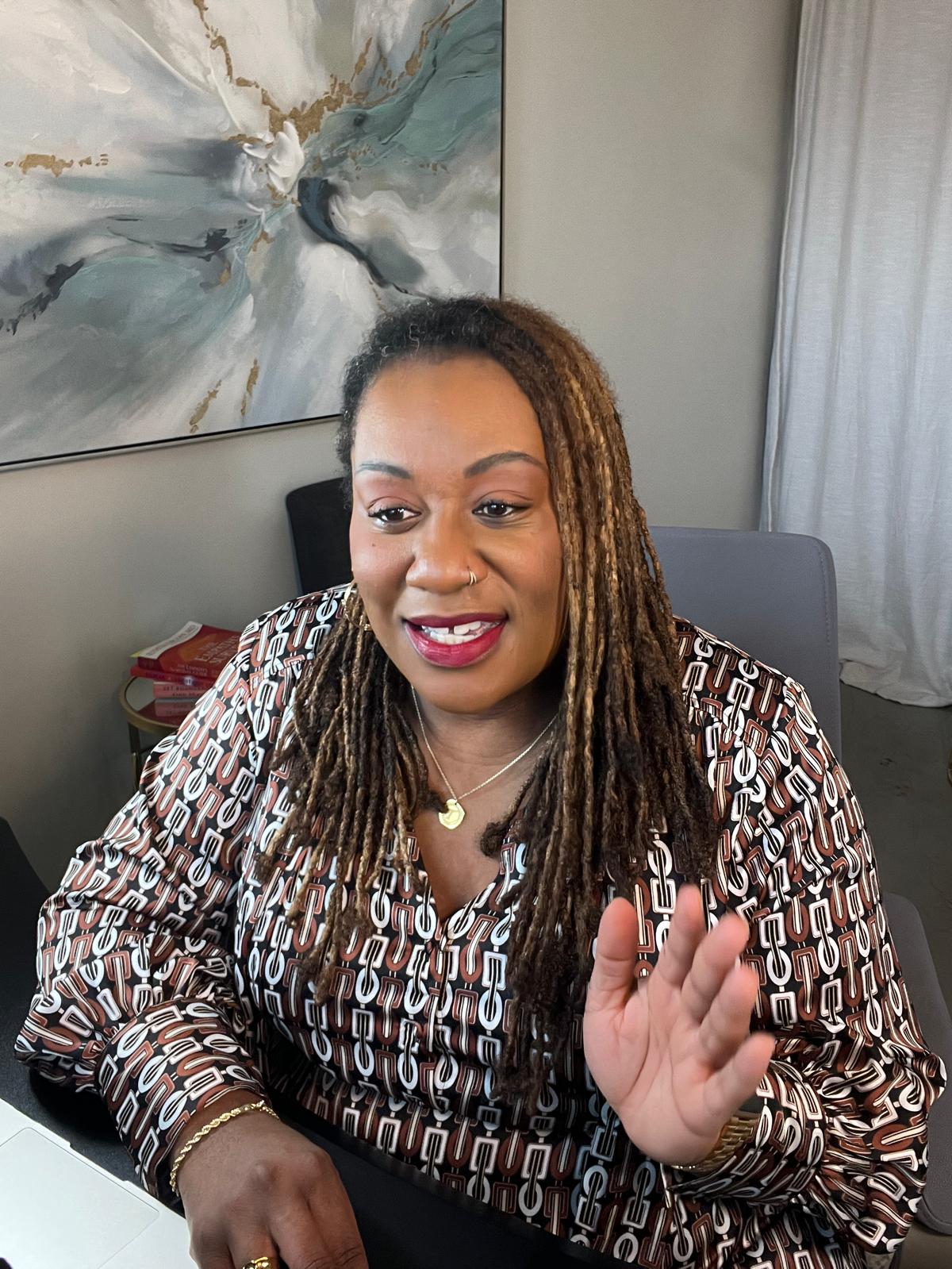 Dr. Tia Morris, DHS, LCSW, in session at her desk